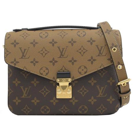 Louis Vuitton
雙色花紋斜背郵差包