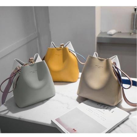 【特樂生活】韓版撞色休閒水桶包(女包/休閒包/單肩包/手提包/斜挎包/側背包)