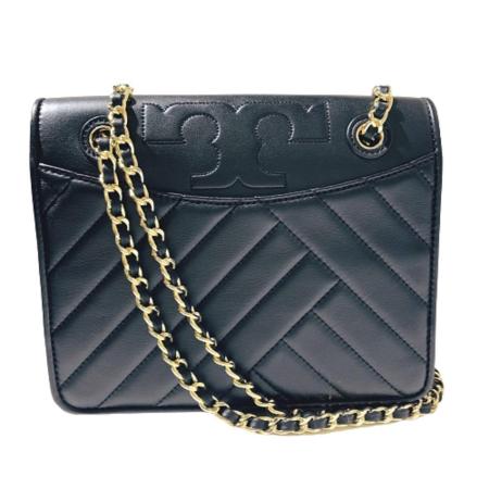 Tory Burch 
山形紋金屬鍊帶斜背包