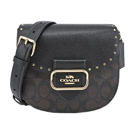 COACH 
皮革鉚釘裝飾馬鞍包