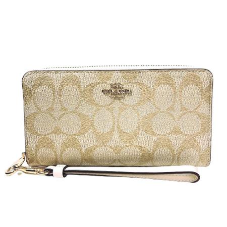 COACH 附禮盒 
馬車LOGO拉鍊長夾